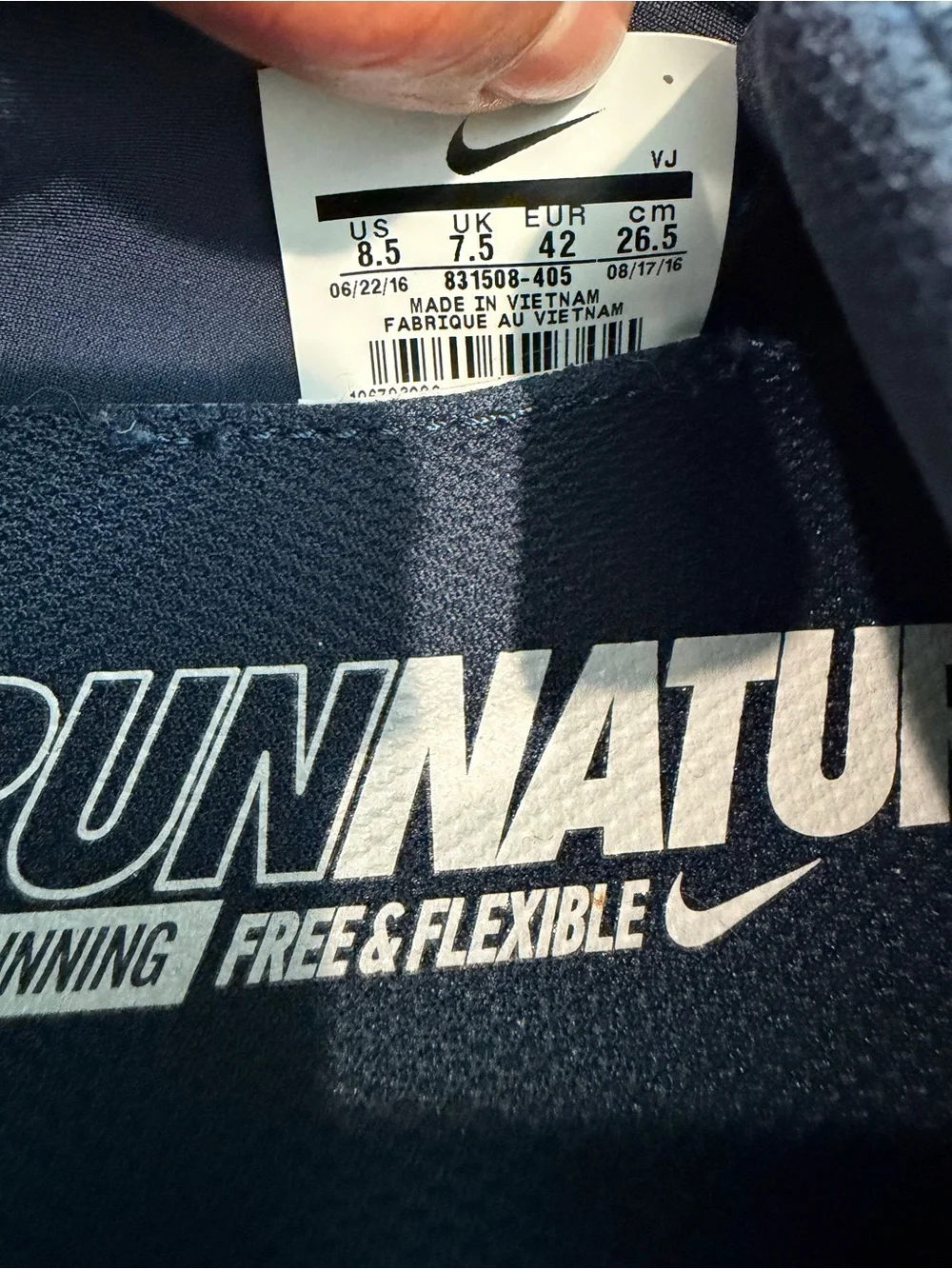 Nike men’s Navy Blue and Light Blue Knit Sneakers